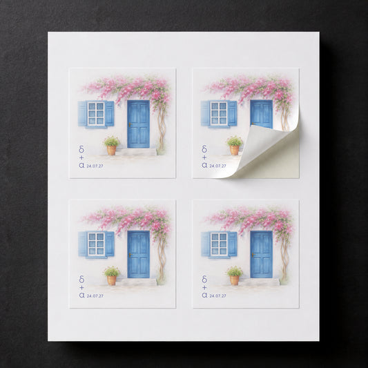 Sheet with four printed Cyclades wedding favor stickers for white paper cube favor boxes.