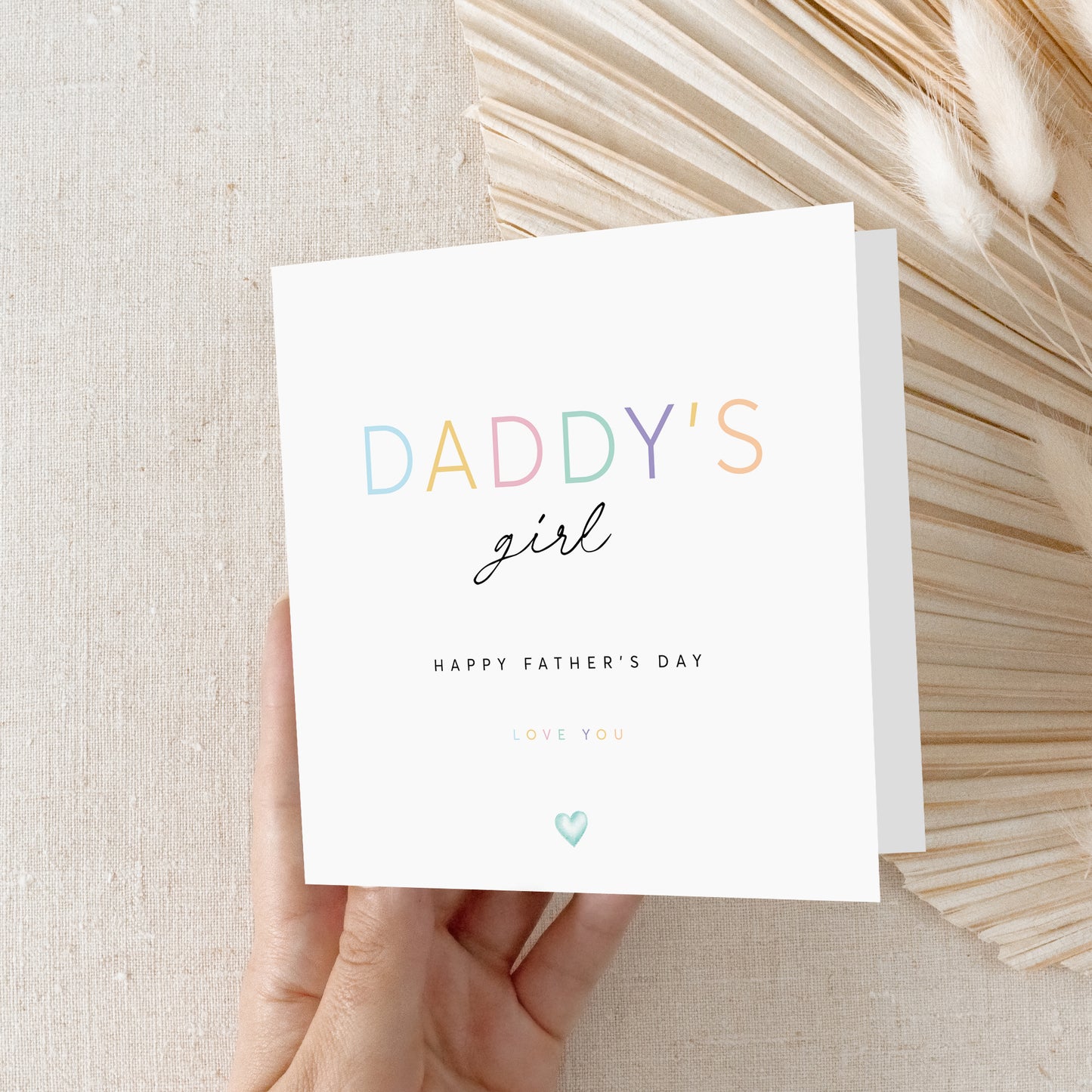 Pastel Daddy's Girl Father's Day greeting card with colorful typography and kraft envelope