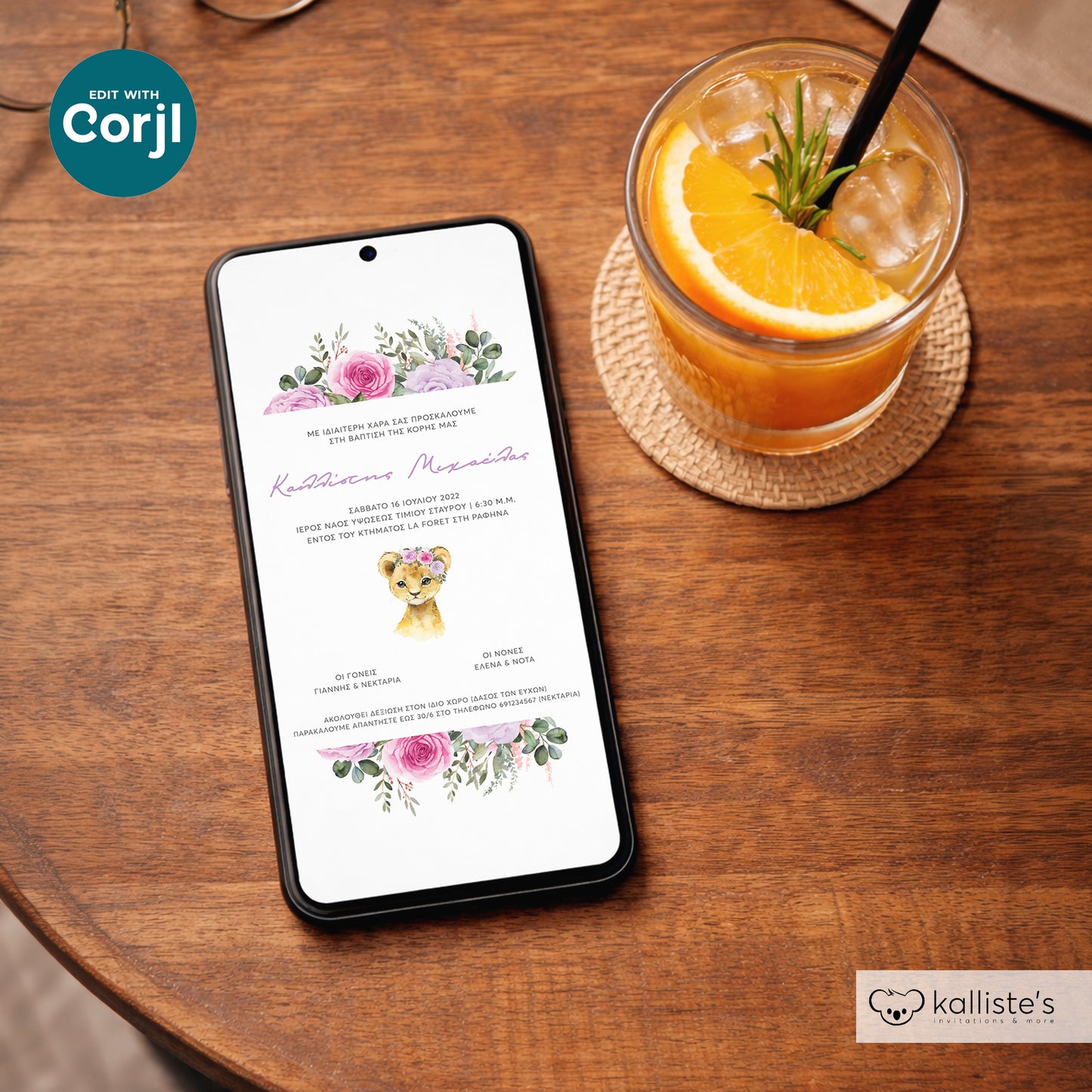 Phone displaying a wedding invitation on a wooden table with a drink