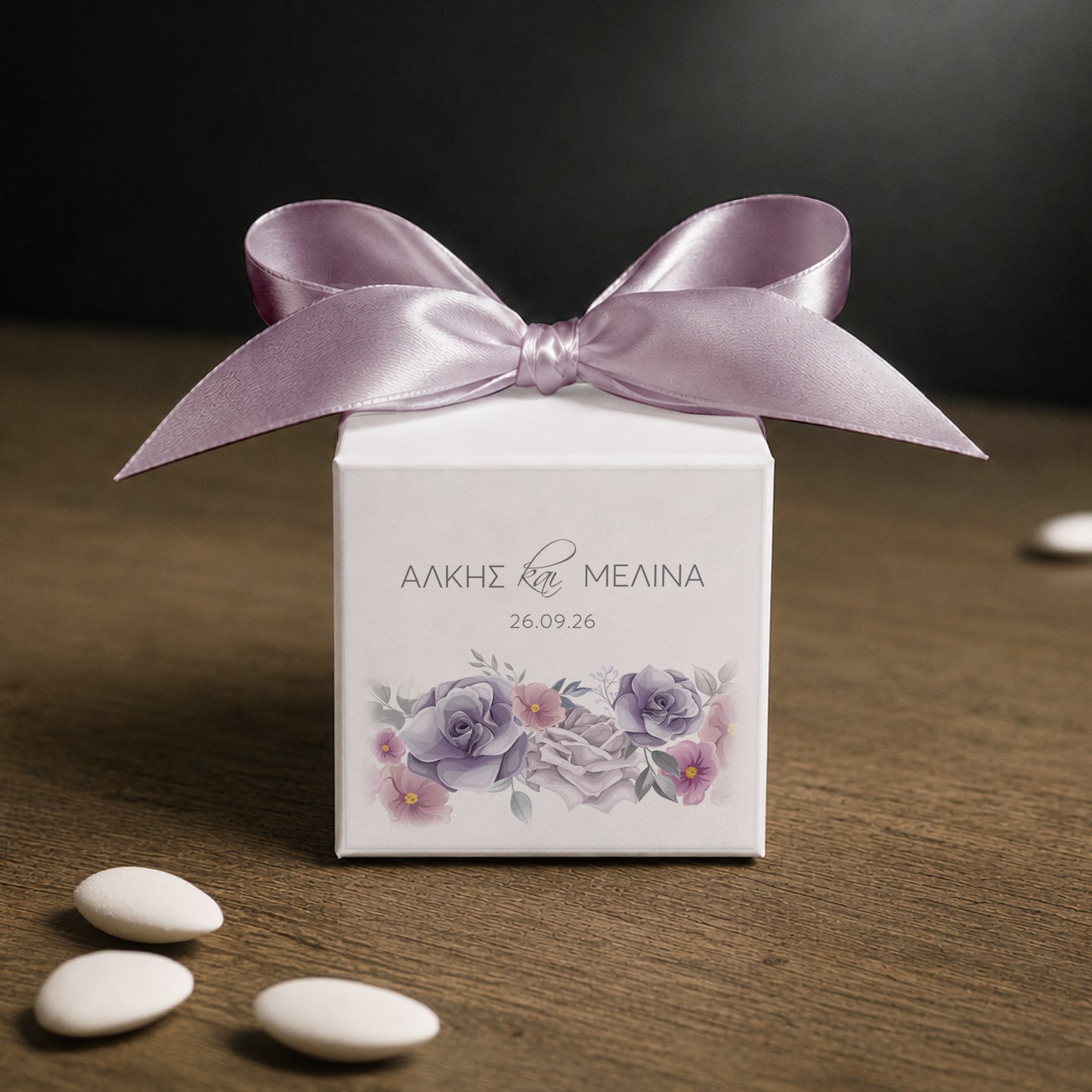 White paper cube favor box 7.5 × 7.5 × 7.5 cm, made from thick 400 gsm paper with printed sticker and ribbon in your choice of color – elegant wedding favor box. Theme: Purple Rose.
