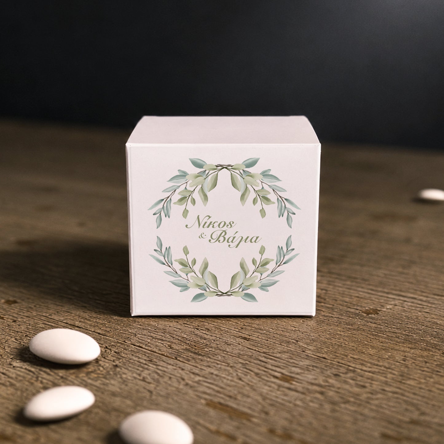 White paper cube favor box with printed sticker – elegant wedding favor box. Theme: Greenery.
