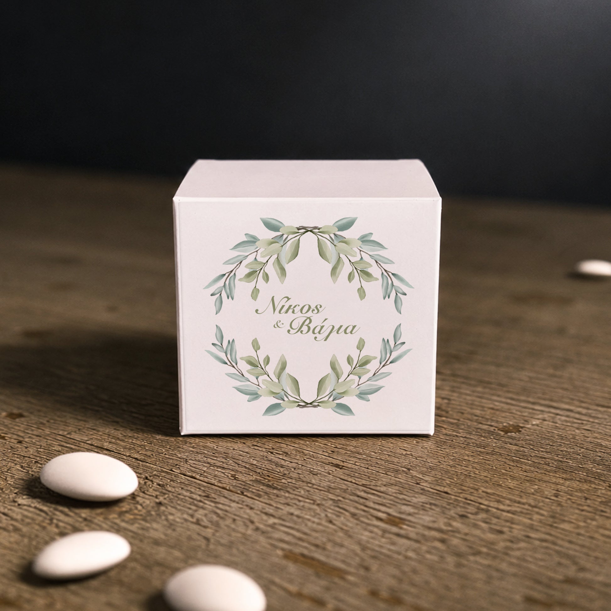 White paper cube favor box with printed sticker – elegant wedding favor box. Theme: Greenery.
