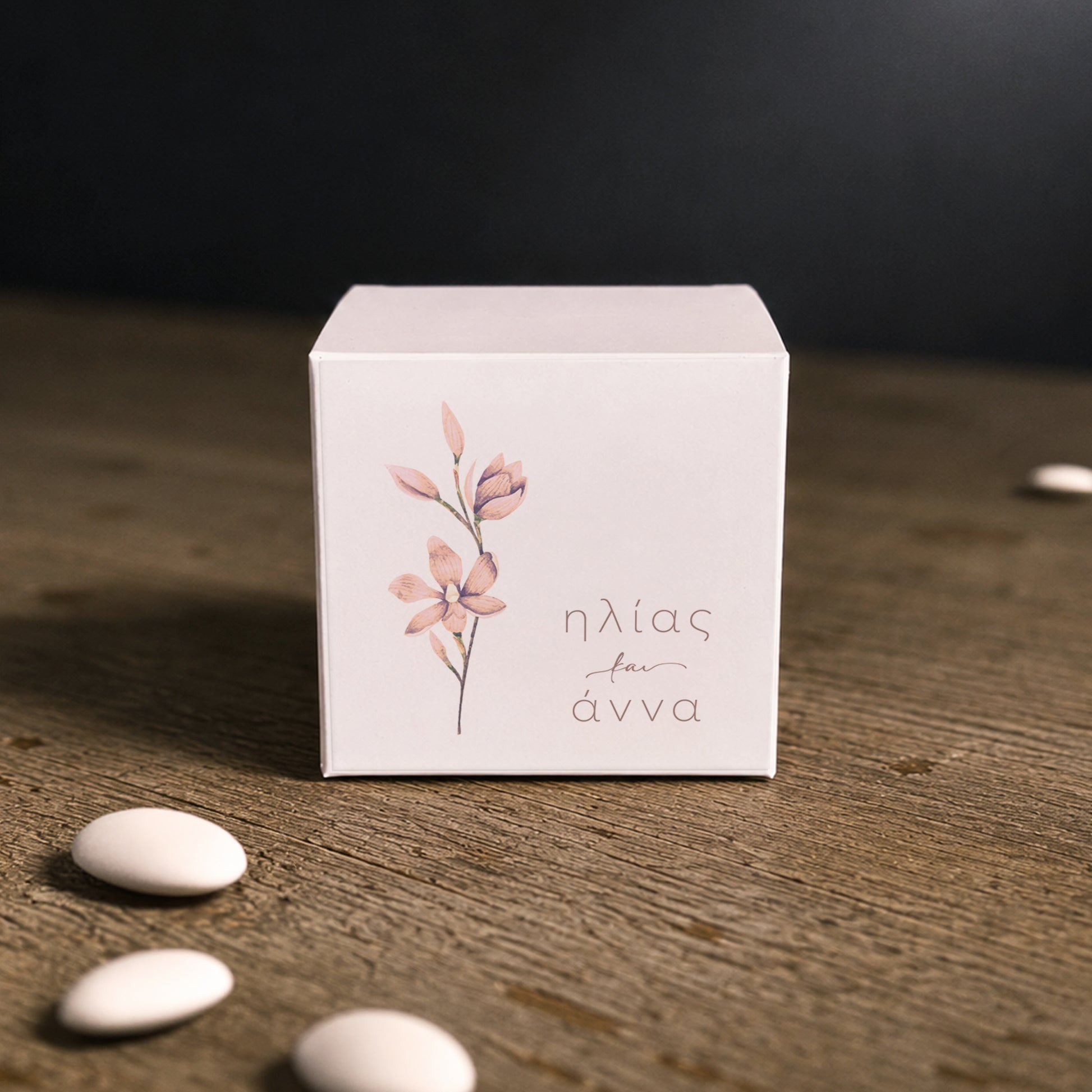 White paper cube favor box with printed sticker – elegant wedding favor box. Theme: Nude Flower.
