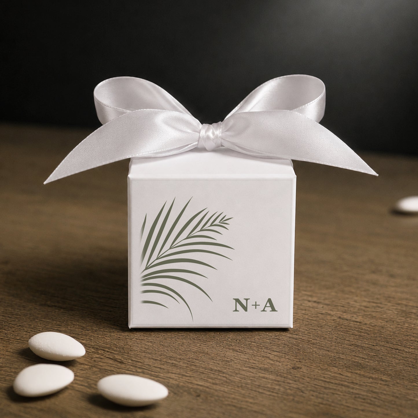 White paper cube favor box 7.5 × 7.5 × 7.5 cm, made from thick 400 gsm paper with printed sticker and ribbon in your choice of color – elegant wedding favor box. Theme: Tropical.
