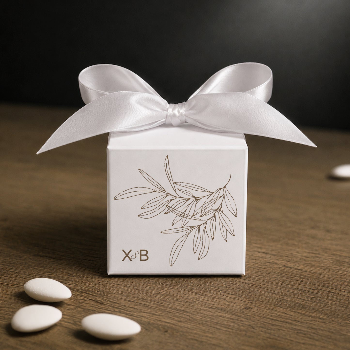 White paper cube favor box 7.5 × 7.5 × 7.5 cm, made from thick 400 gsm paper with printed sticker and ribbon in your choice of color – elegant wedding favor box. Theme: Olive.
