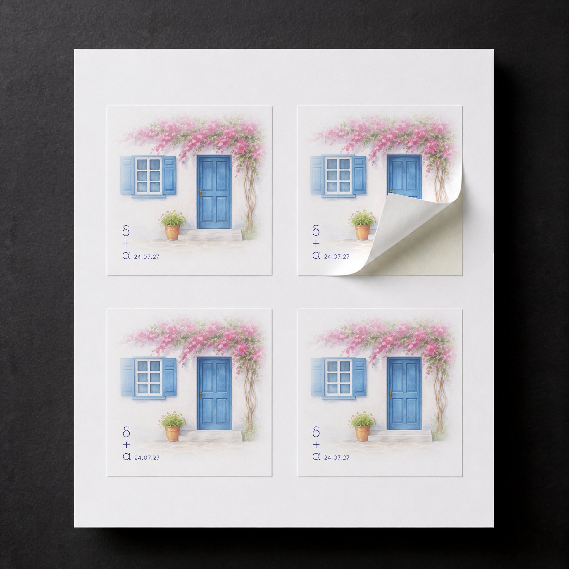 Sheet with four printed Cyclades wedding favor stickers for white paper cube favor boxes.

