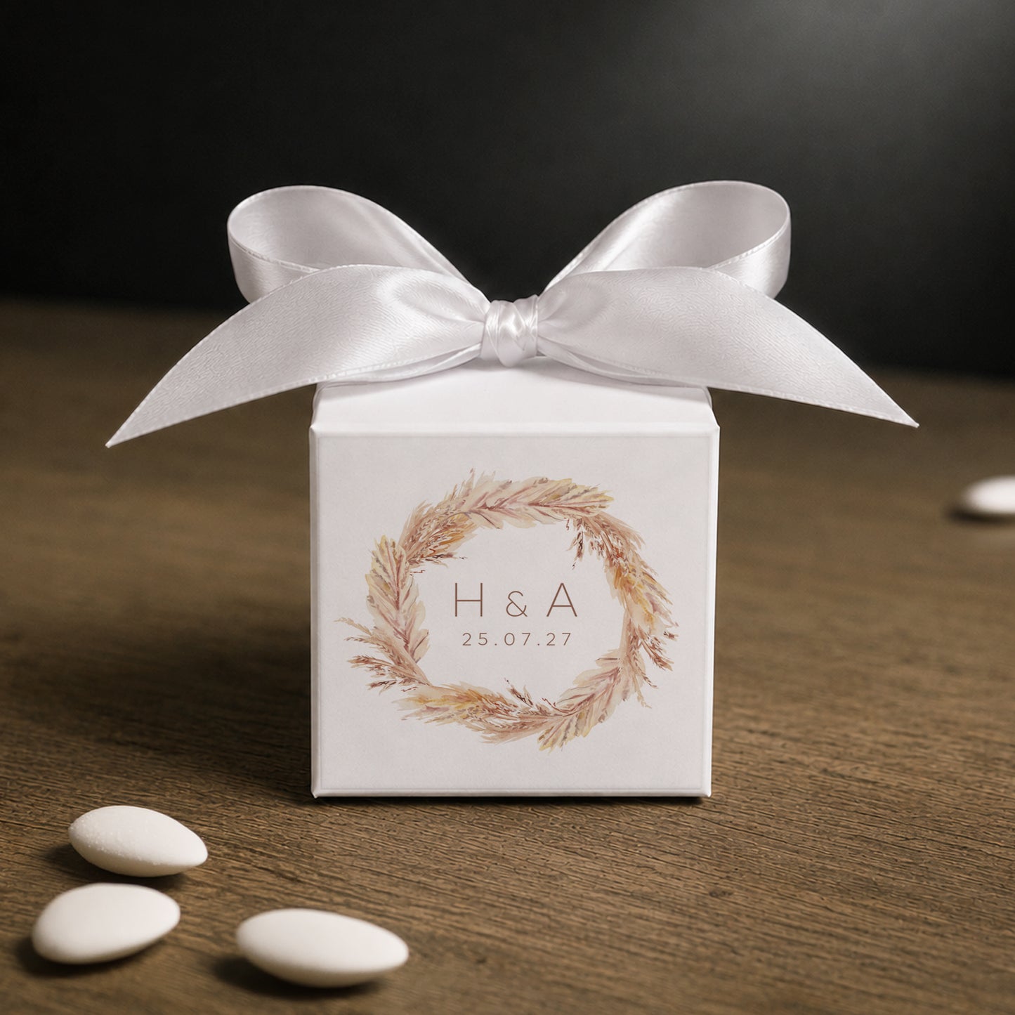 White paper cube favor box 7.5 × 7.5 × 7.5 cm, made from thick 400 gsm paper with printed sticker and ribbon in your choice of color – elegant wedding favor box. Theme: Pampas.
