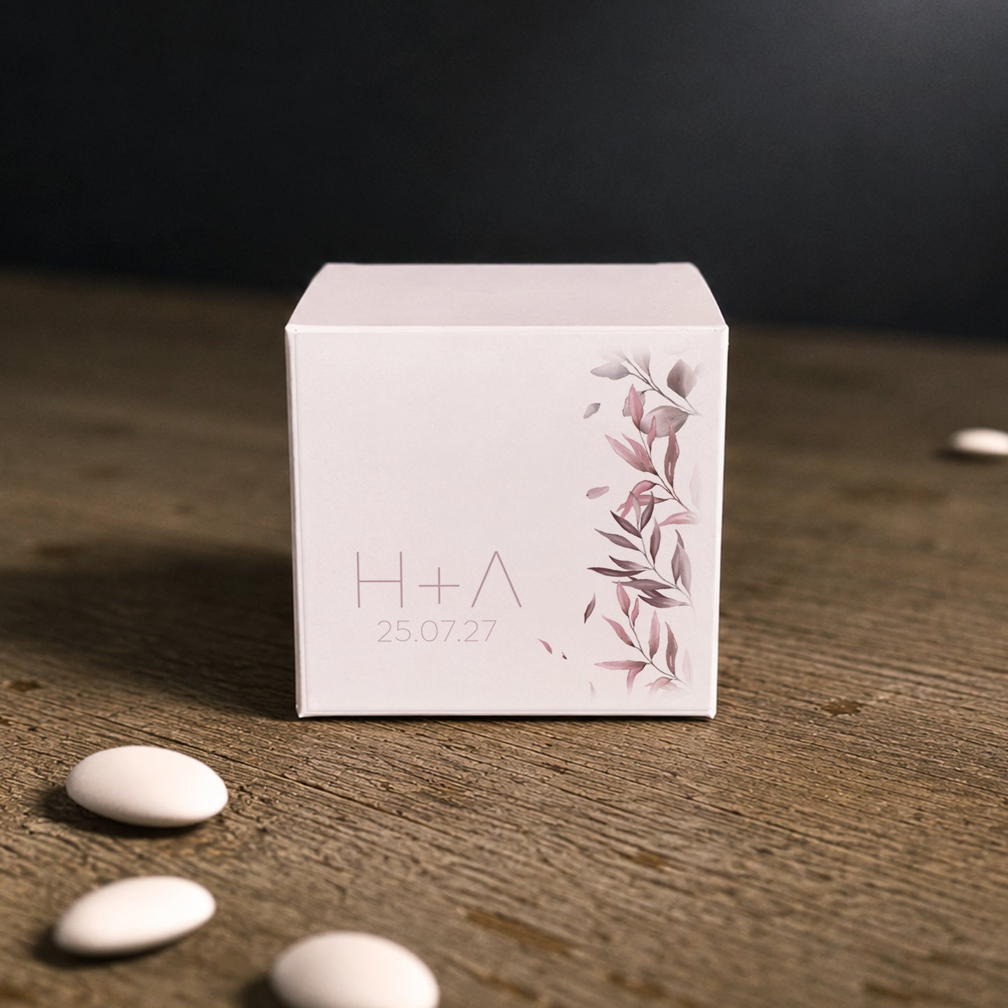 White paper cube favor box with Pink Leaves printed sticker – elegant wedding favor box.
