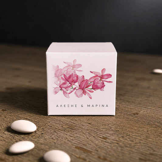 White paper cube favor box with printed sticker – elegant wedding favor box. Theme: Magnolia.
