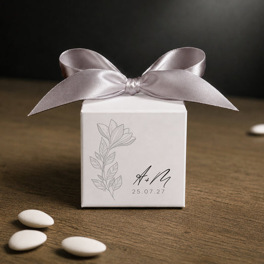 White paper cube favor box 7.5 × 7.5 × 7.5 cm, made from thick 400 gsm paper with printed sticker and ribbon in your choice of color – elegant wedding favor box. Theme: Line Black Flowers.
