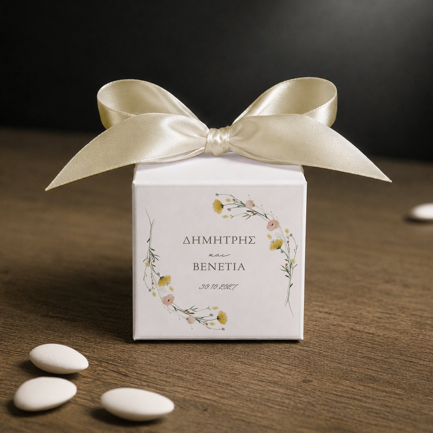 White paper cube favor box 7.5 × 7.5 × 7.5 cm, made from thick 400 gsm paper with printed sticker and ribbon in your choice of color – elegant wedding favor box. Theme: Field Romance.
